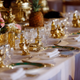 A table dressed to evoke the settings of Britain's Queen Elizabeth II's 1953 Coronation State Banquets.